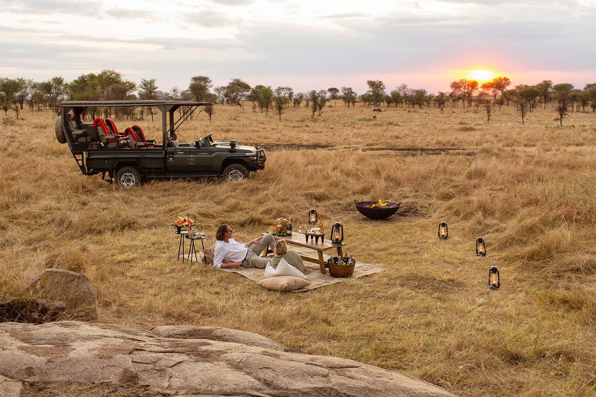 Sundowner in the northern Serengeti Sundowner in the northern Serengeti while staying at Siringit Migration Camp