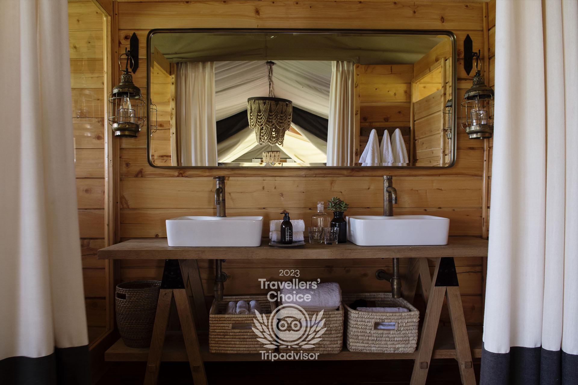 Serengeti Camp ensuite bathroom An ensuite bathroom with “his and hers” wash hand basins, large shower and proper flush toilet complete each guest tent
